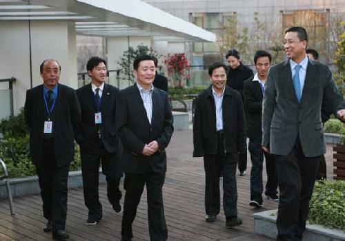 2009年3月四川省粮食局副局长石恩祥一行来学院交流访问.jpg